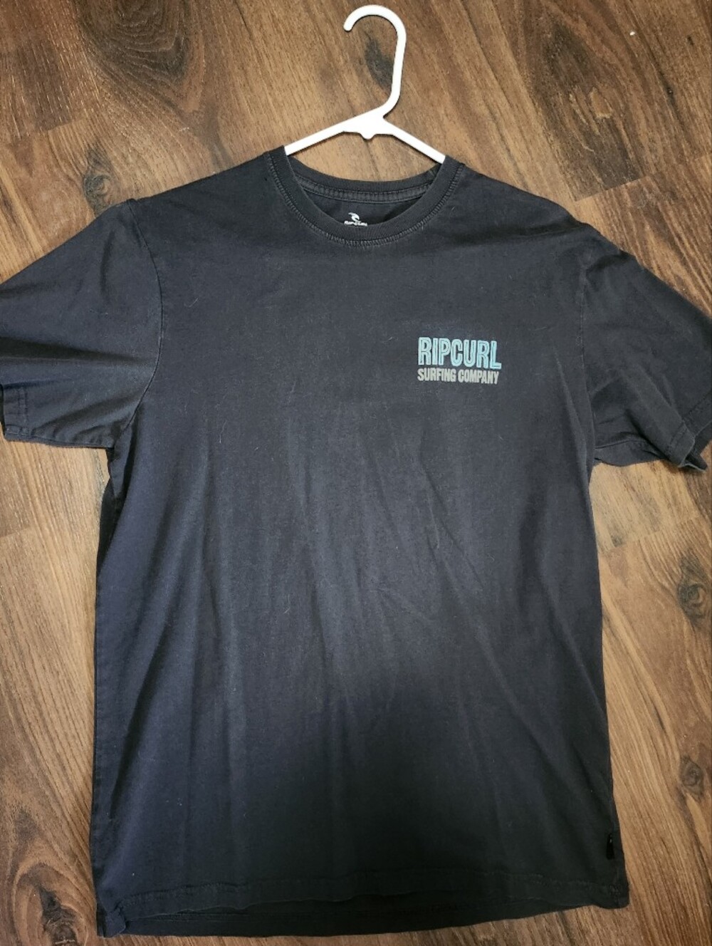 Rip Curl Dark Grey Short Sleeve Tee with Teal Chest Logo & Graphic Design Back